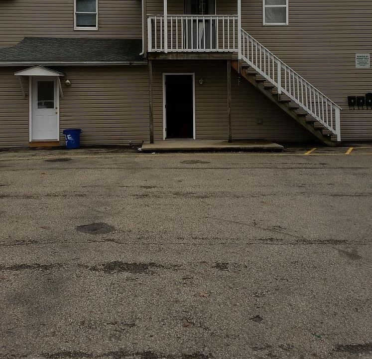 Outside view with paved parking.