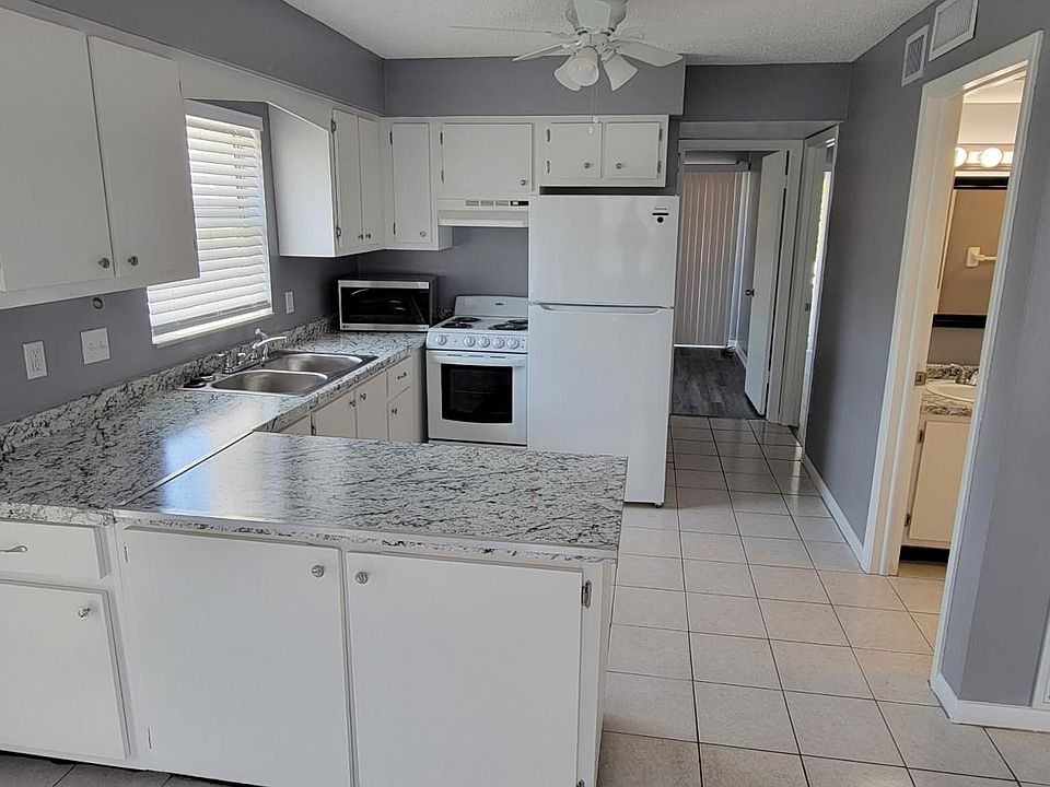 Kitchen with Island. Plenty of Cabinets. New appliances.