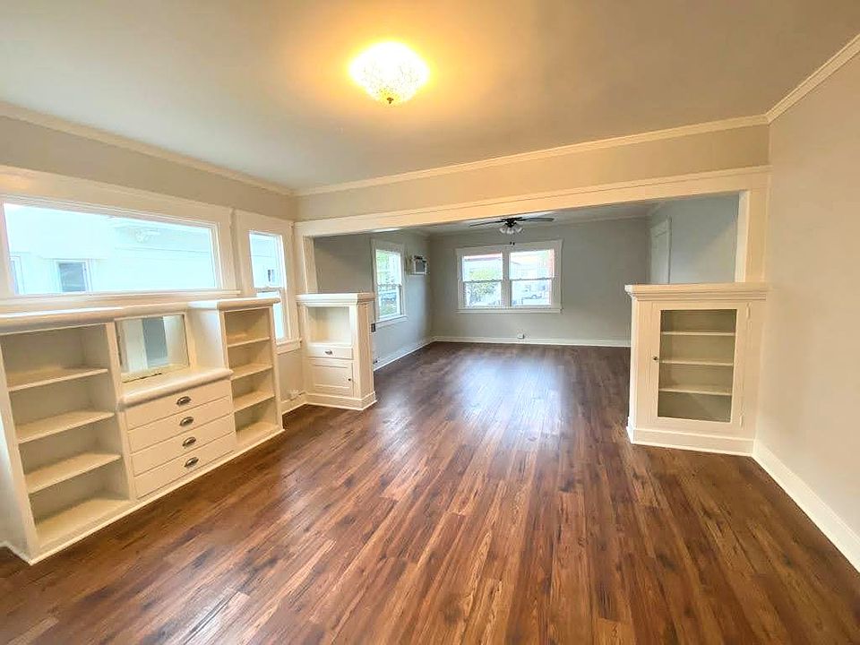 living room and dining room with original built-ins