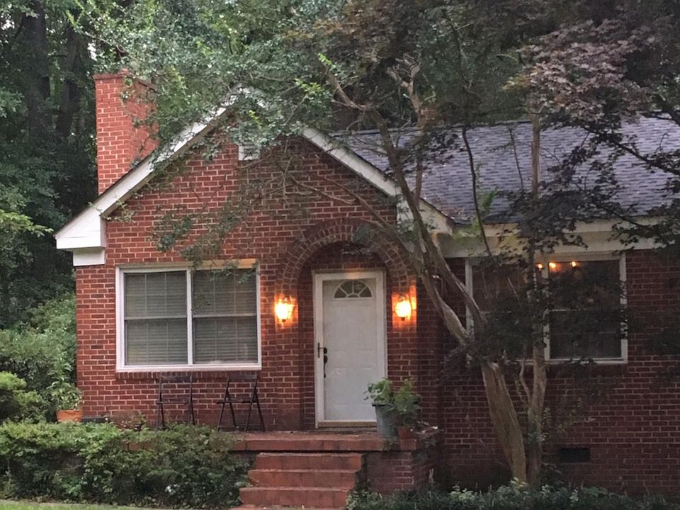 beautiful, all brick bungalow with hardwood floors and huge back yard and deck all amongst the luscious forests, creeks of downtown rosewood.