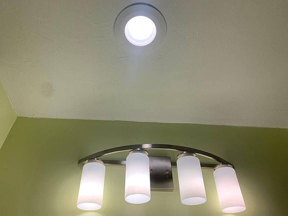 Overhead lighting provides ample illumination for this interior space, creating a clean, functional setting.