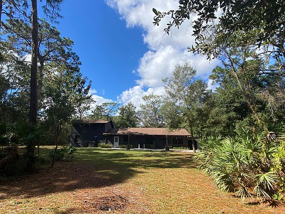 Backyard looking West to House