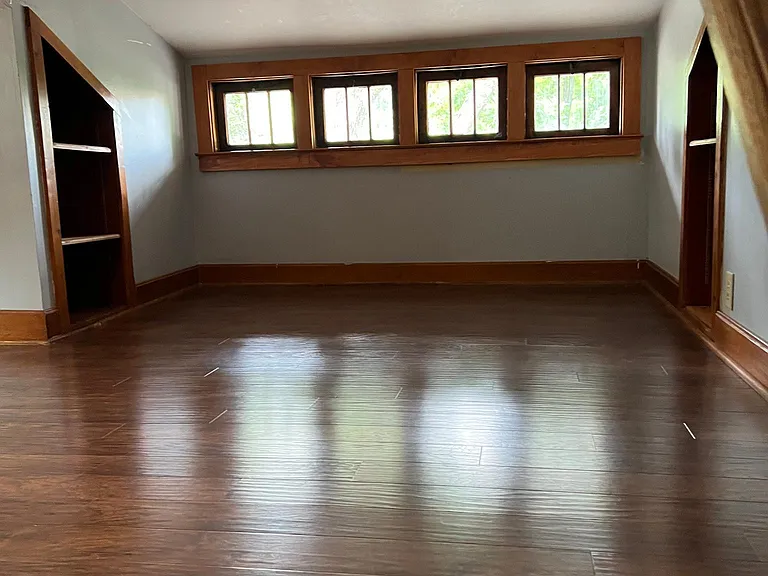 OVERSIZED bedroom on 2nd floor with fabulous windows and closets.