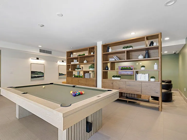 Challenge a neighbor to billiards in the resident game room
