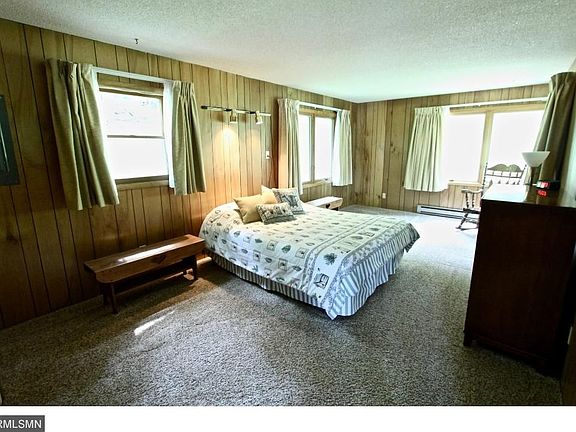 Spacious Master bedroom with room for nightstands and dresser.