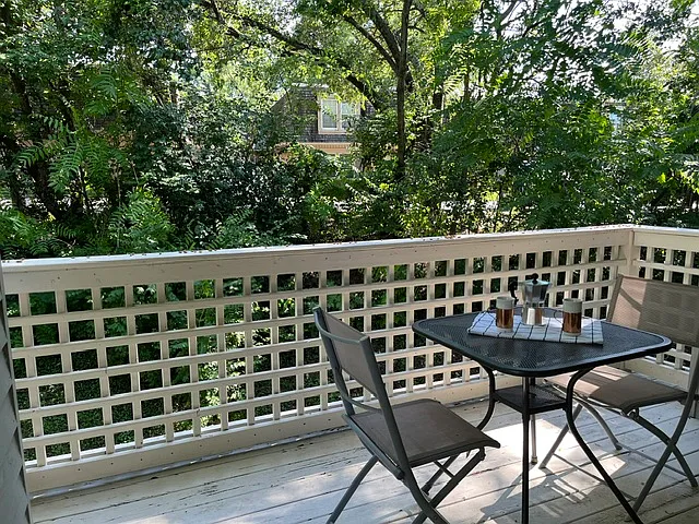 Balcony off of dining and living area. Wonderful private setting looking into trees instead of another building!