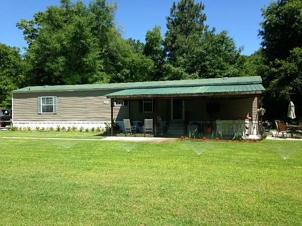 Front of House and yard (on 12 Acre Lot)