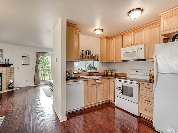 New ceiling lights in kitchen and new garbage disposal.  Refrigerator stays. 