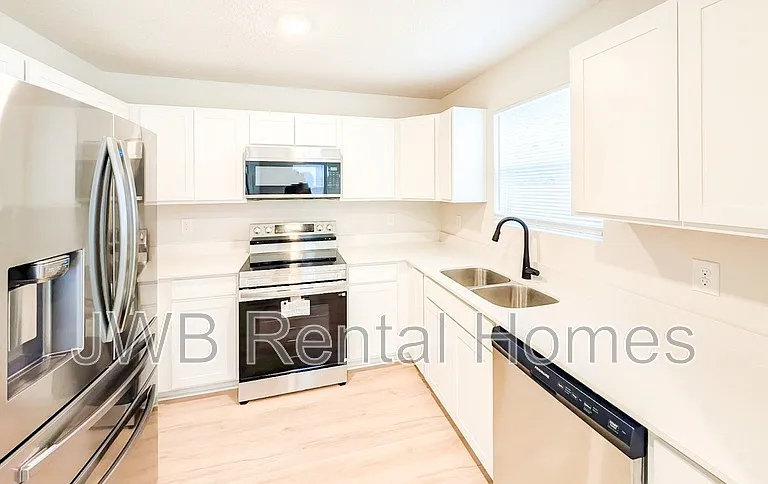4296 Gilbert St — Photo 2
