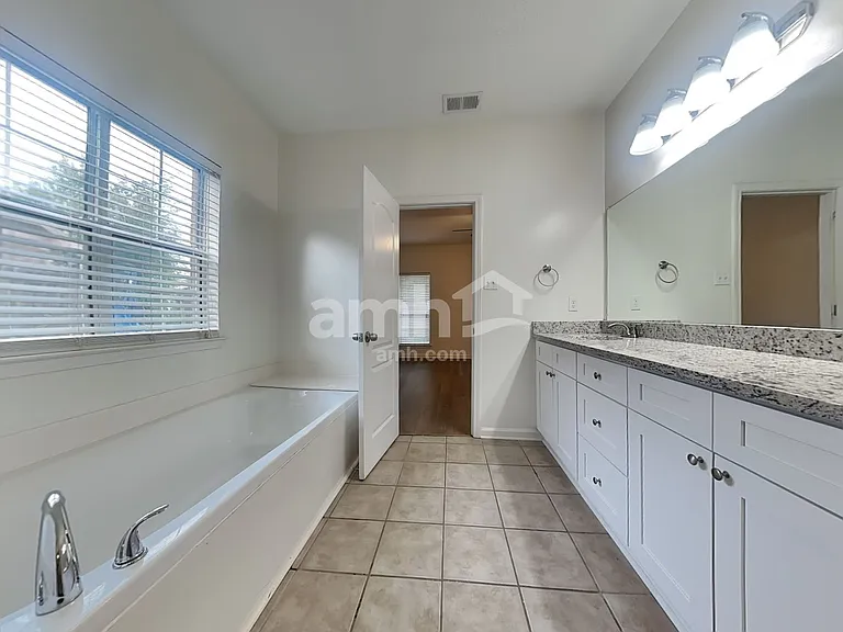 7138 Arcastle Loop W — Photo 14