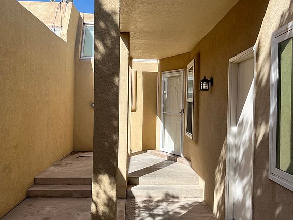 Secured (lock by gate) front courtyard