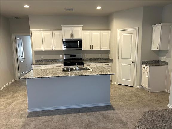 Kitchen - All Home and community information, including pricing, included features, terms, availability and amenities, are subject to change at any time without notice or obligation. All Drawings, pictures, photographs, video, square footages, floor plans, elevations, features, colors and sizes are approximate for illustration purposes only and will vary from the homes as built.