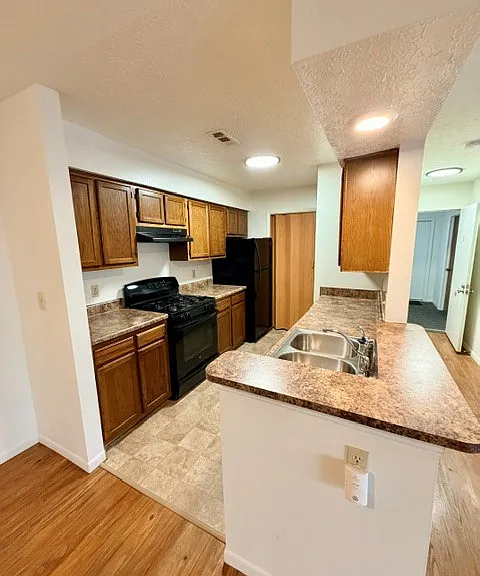 Black appliances, newer counters
