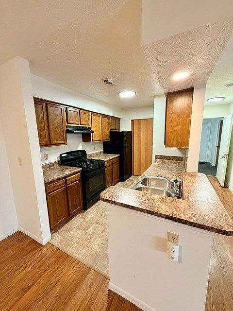 Black appliances, newer counters