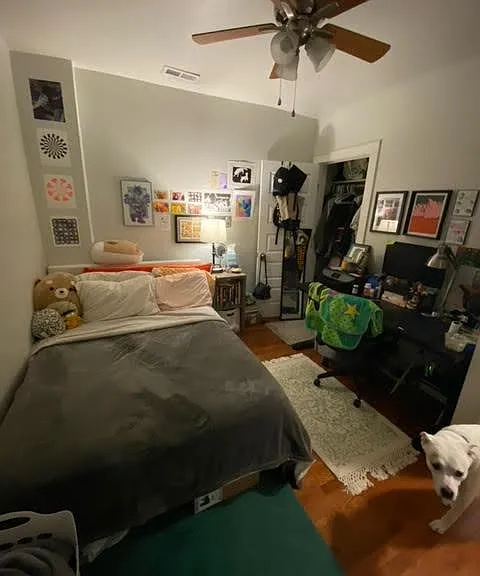 Bedroom 2, staged with last tenant's belongings.