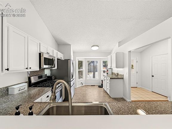 5th image of 924 White Stone Way