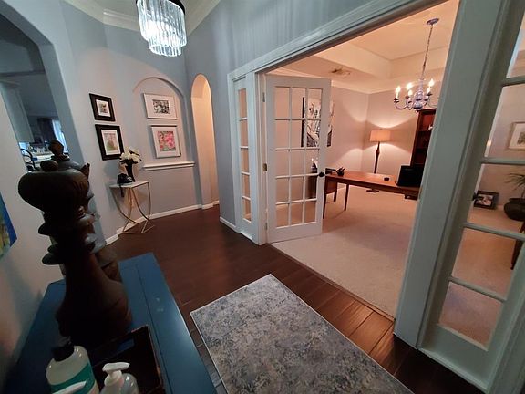 As you enter the home the beautiful Study/ dining room is on your righr behind the French Doors.