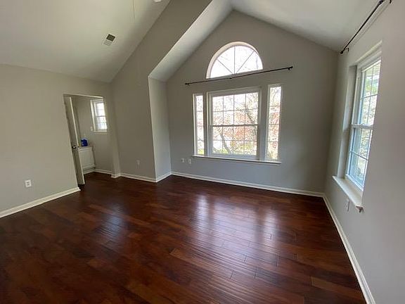 Master bedroom with high ceiling