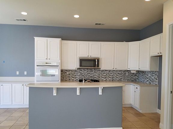 5th image of 10976 Dandelion Ln