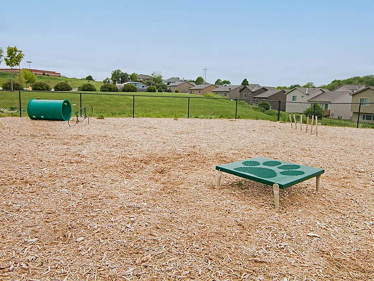 Our dog park even includes agility equipment for your dogs to have fun and exercise.