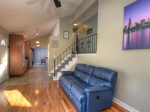 Living room with vaulted ceiling