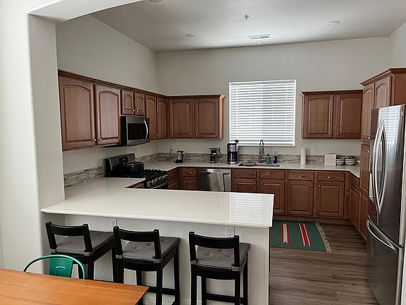 Turn-key kitchen with all of the dishes and supplies you'll need from day one, including coffee maker, burr grinder, Breville mini-oven/air frier (Just add groceries!)