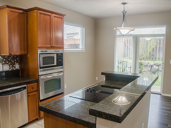 dining/seating area with a fenced back yard