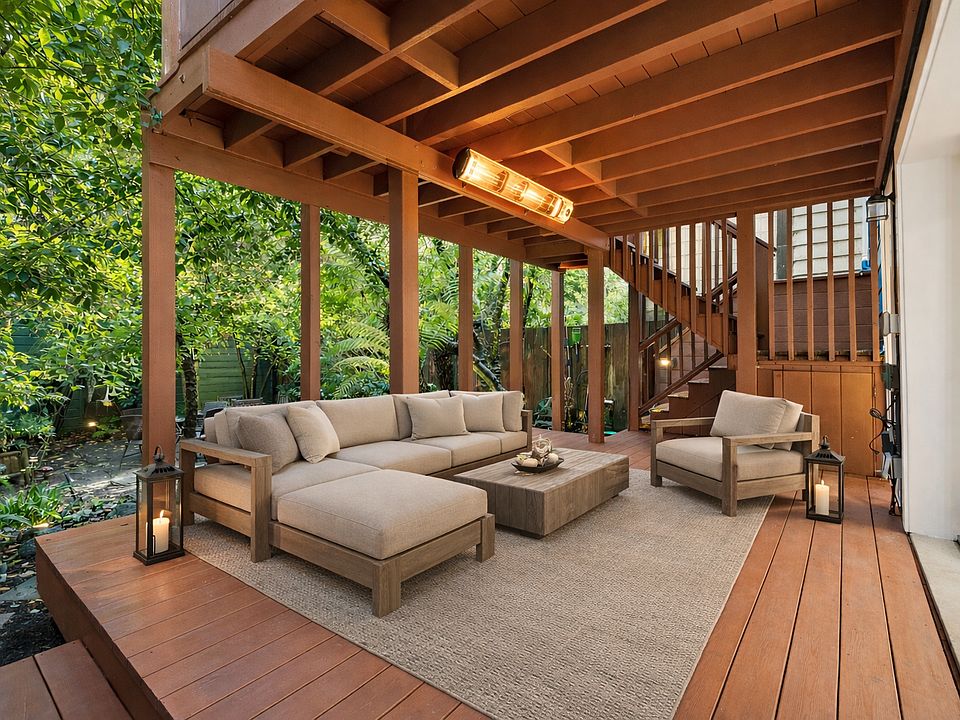 Virtually staged. Step directly from your heated private deck into a professionally maintained landscaped garden. The garden is shared with two other units but is quiet and very private.