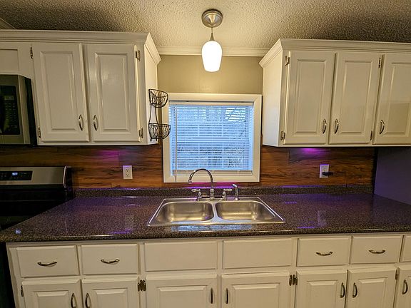 Above sink window and light