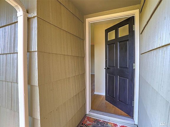 Additional space on the side of the house allows for RV parking. The kitchen features a garden window overlooking the backyard as well as a stainless steel microwave and dishwasher. French doors off the eat-in kitchen   open to the entertainment sized patio and large fully fenced backyard. Fantastic commuter location with easy access to freeways, airport, hospital, major retail, dining & business hubs.