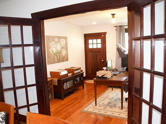 Formal living room, currently being utilized as an office