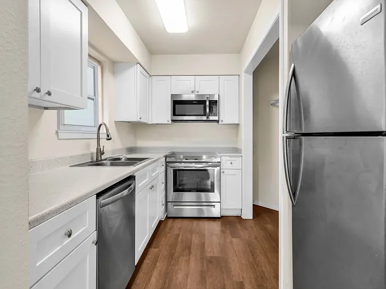 Included Dishwasher, garbage disposer, double sided sink