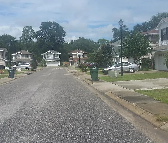 Sidewalks both sides/street lights