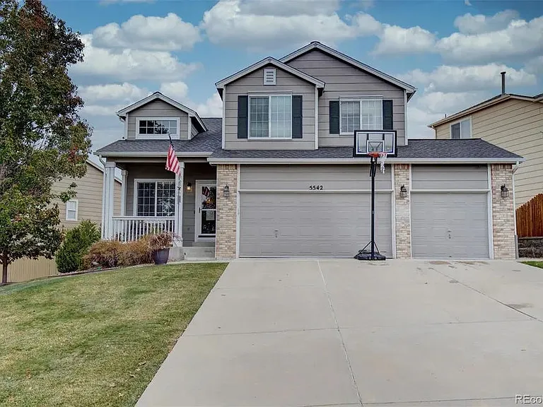 5542 S Valdai Way — Photo 1