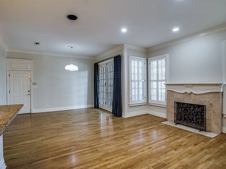 The den, combined with the dining-breakfast space, has multiple windows that bring the natural light in. A second gas fireplace provides a cozy atmosphere on those fall and winter days. Easy access to both the 2-car garage and the backyard. Note: Fabric c