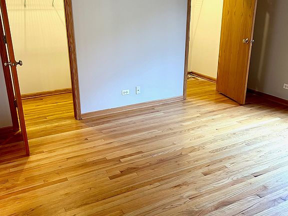 Primary bedroom with 2 walk in closets