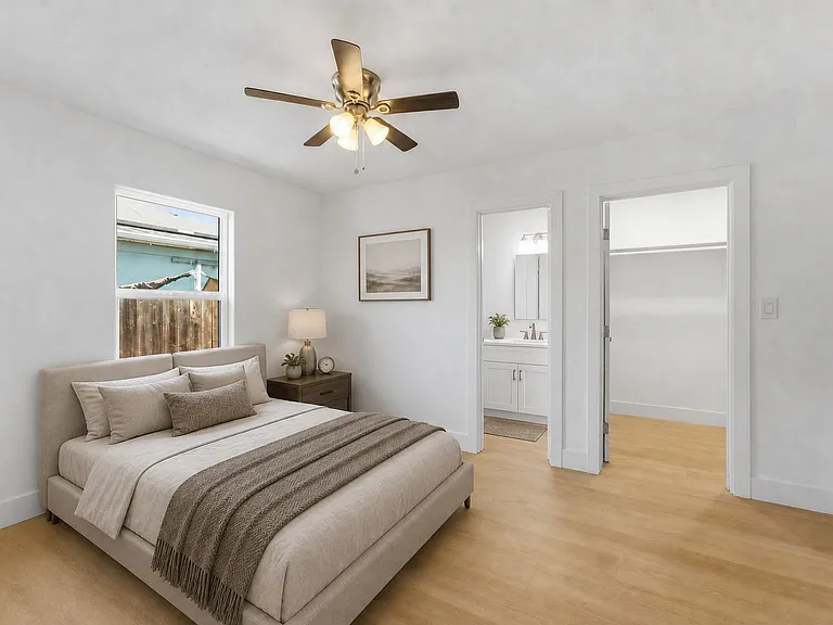 Master bedroom with en suite bathroom and walk in closet.