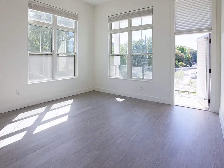 Living Room with Balcony and Hard Surface Flooring