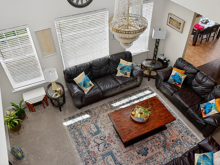 Livingroom _ Shown furnished. If a furnished rental arrangement is agreed upon, the room would be presented as shown.