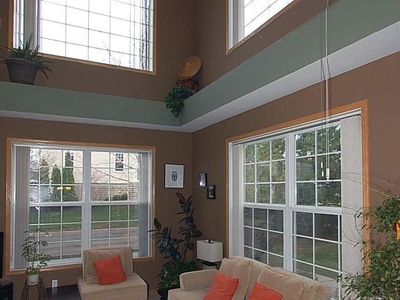Livingroom- vaulted ceiling, open floor plan, natural light