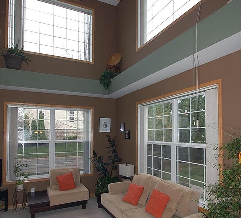 Livingroom- vaulted ceiling, open floor plan, natural light