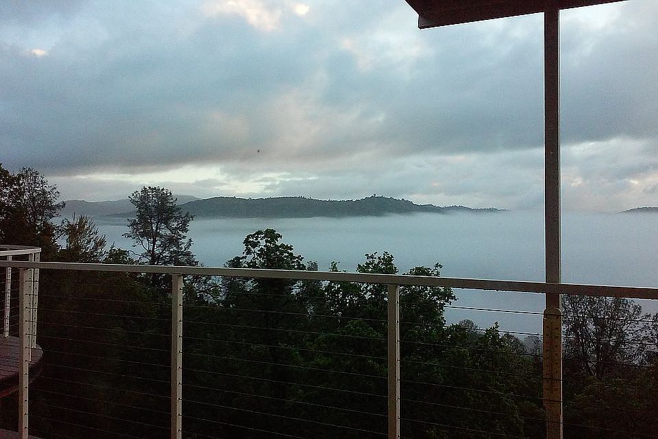 winter morning fog over lake