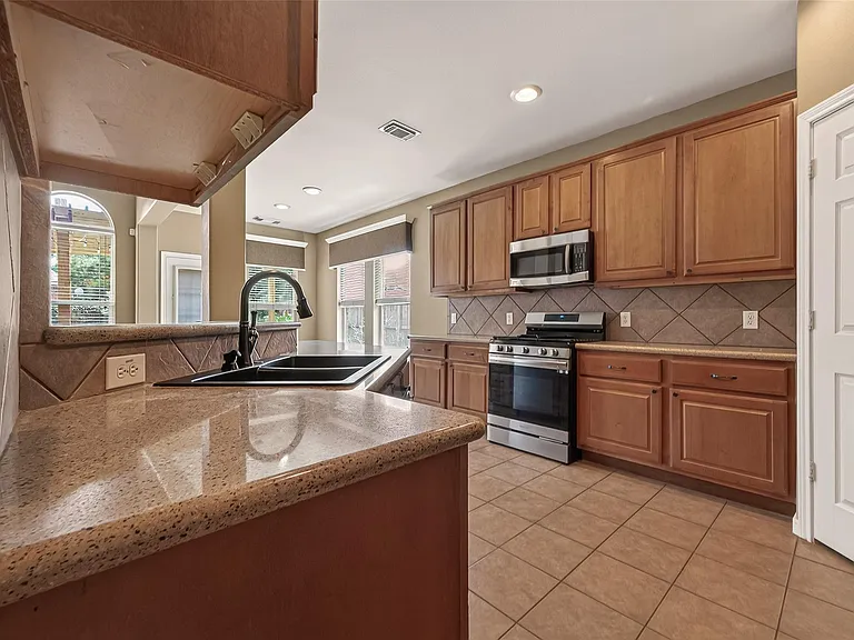 4702 Autumn Orchard Ln — Photo 22