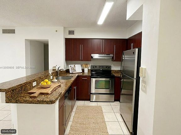 3rd image of 761 N Pine Island Rd APT 104