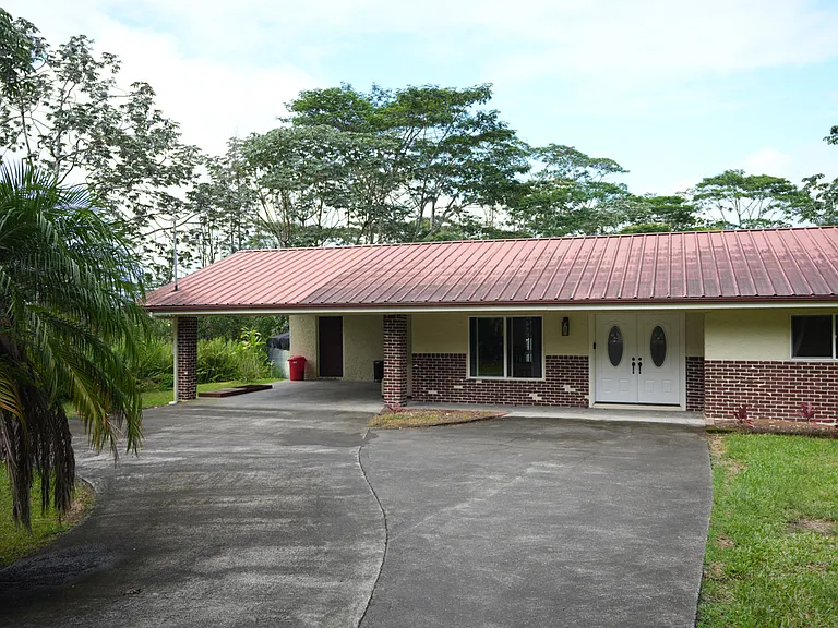 Front door with covered carport