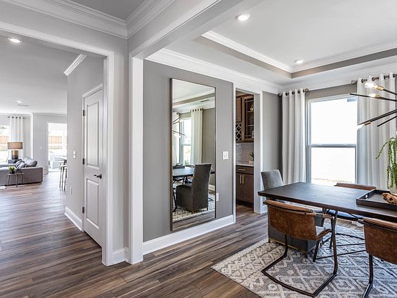 Traditional Dining Room Adjacent to Foyer