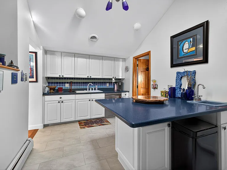 Again, heated floors along with the baseboard heating each on a separate thermostat.