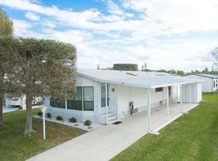 374 Dolphin Cir, Barefoot Bay, FL 32976