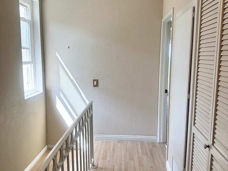 2nd floor landing with washer/dryer closet