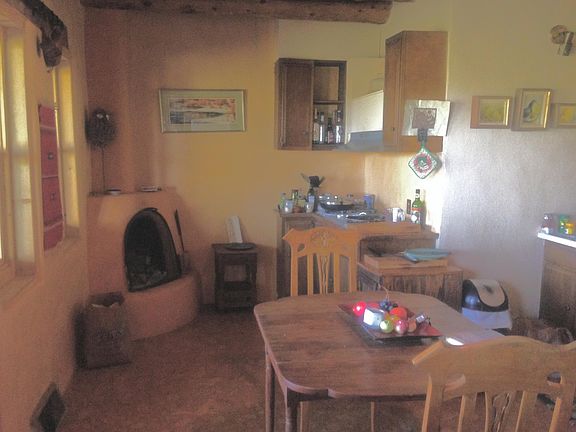 The kitchen. with kiva fireplace